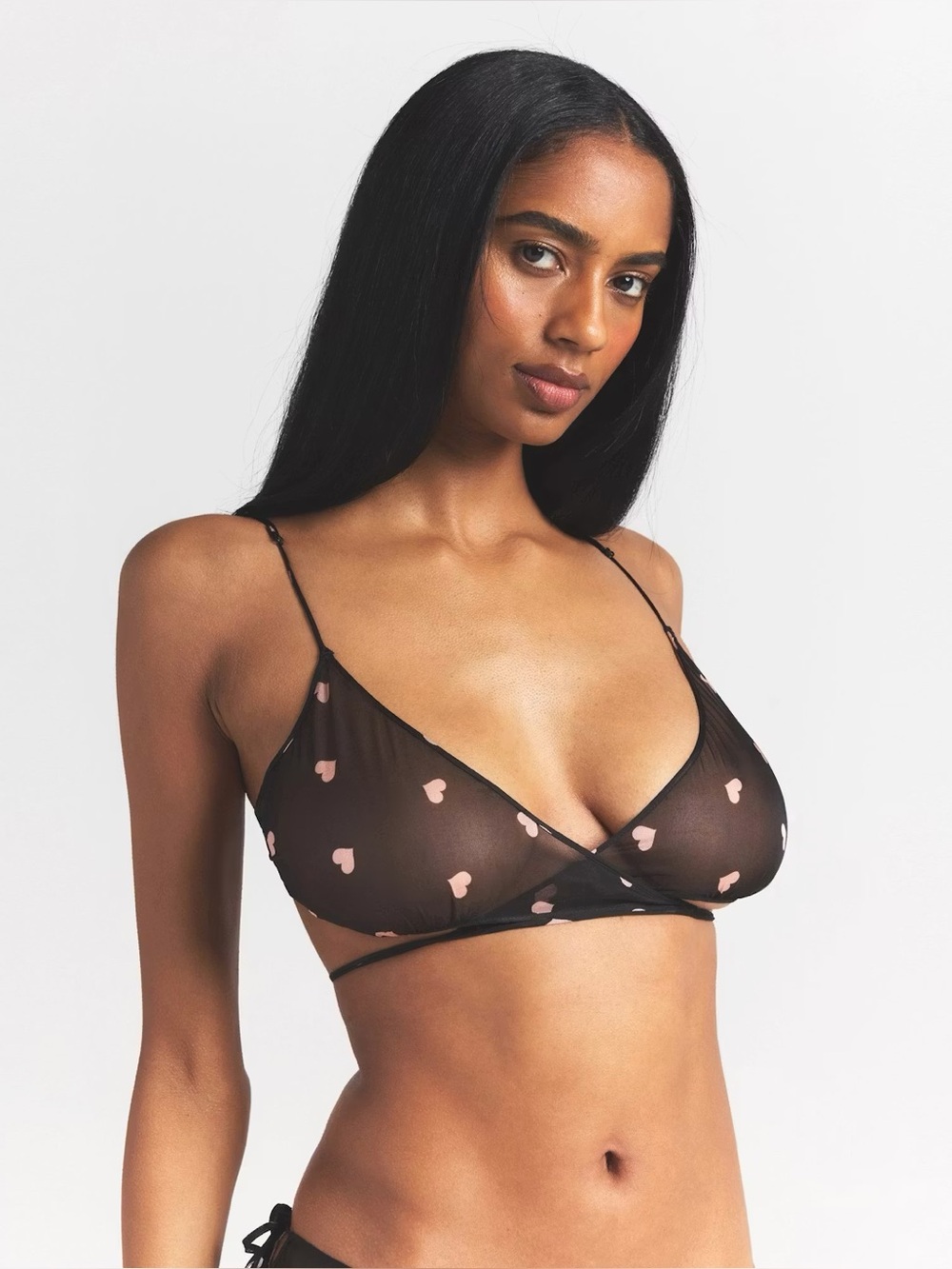 Skims Romance skimpy wrap bralette and garter hipster